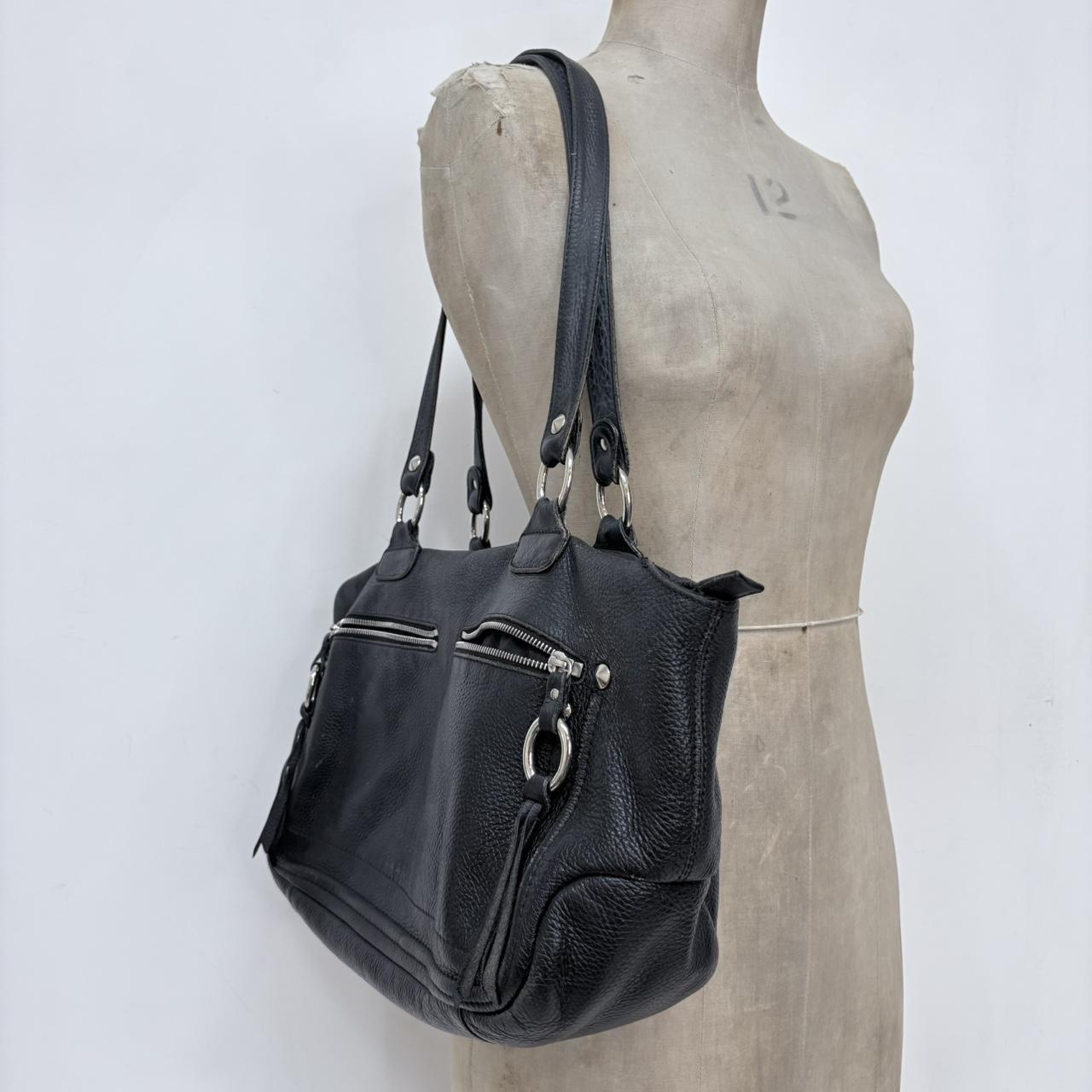 Black leather slouchy tassel bag