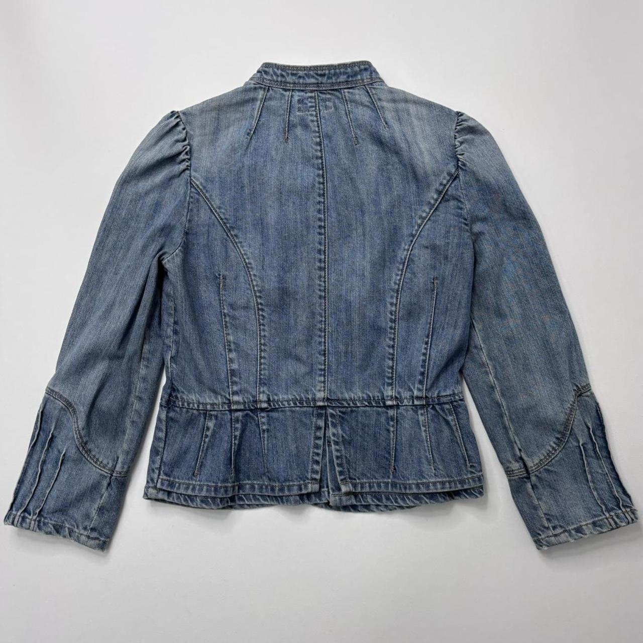 Distressed fitted denim jacket