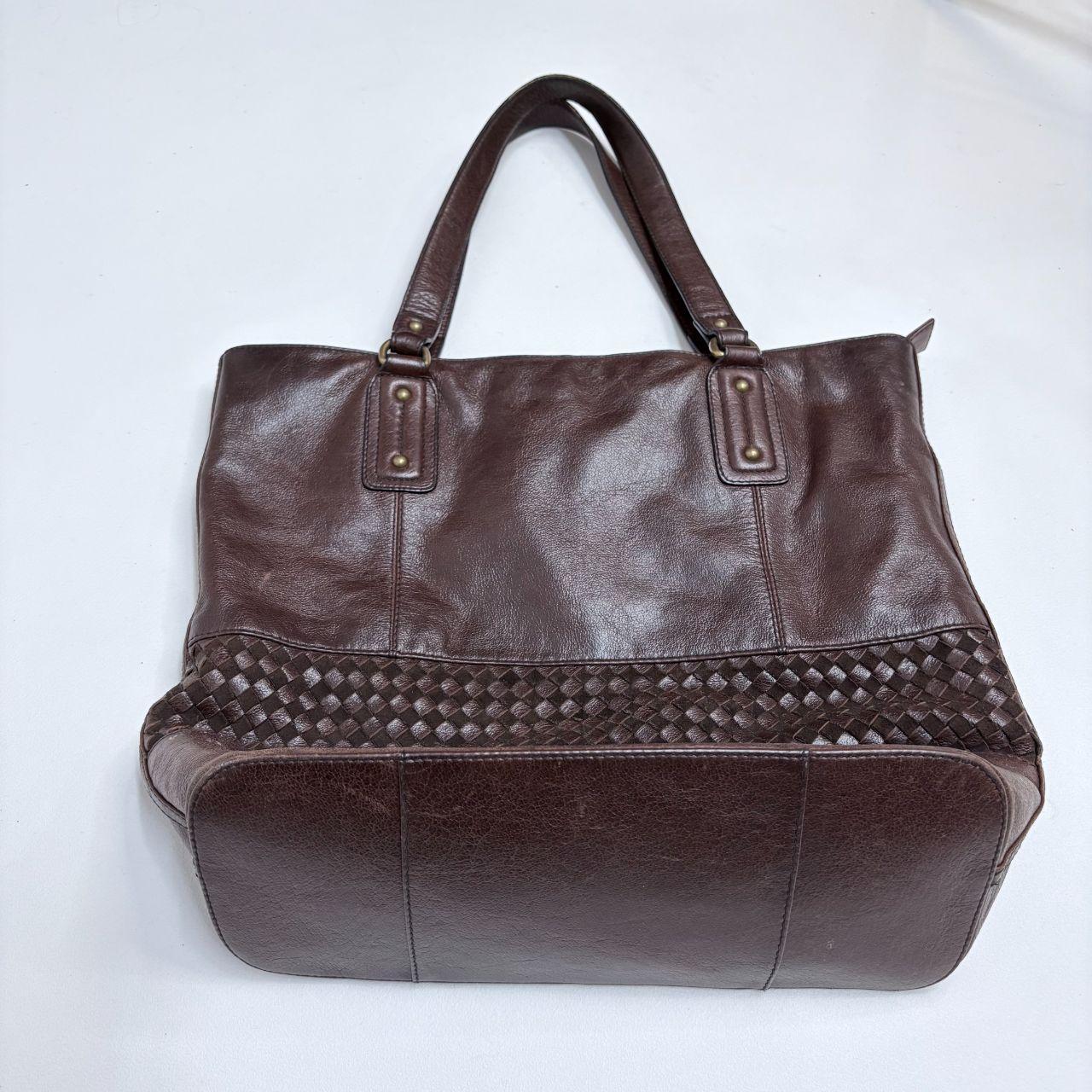 Brown leather woven bag