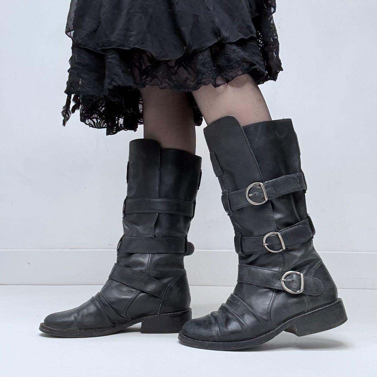 Black leather buckle boots