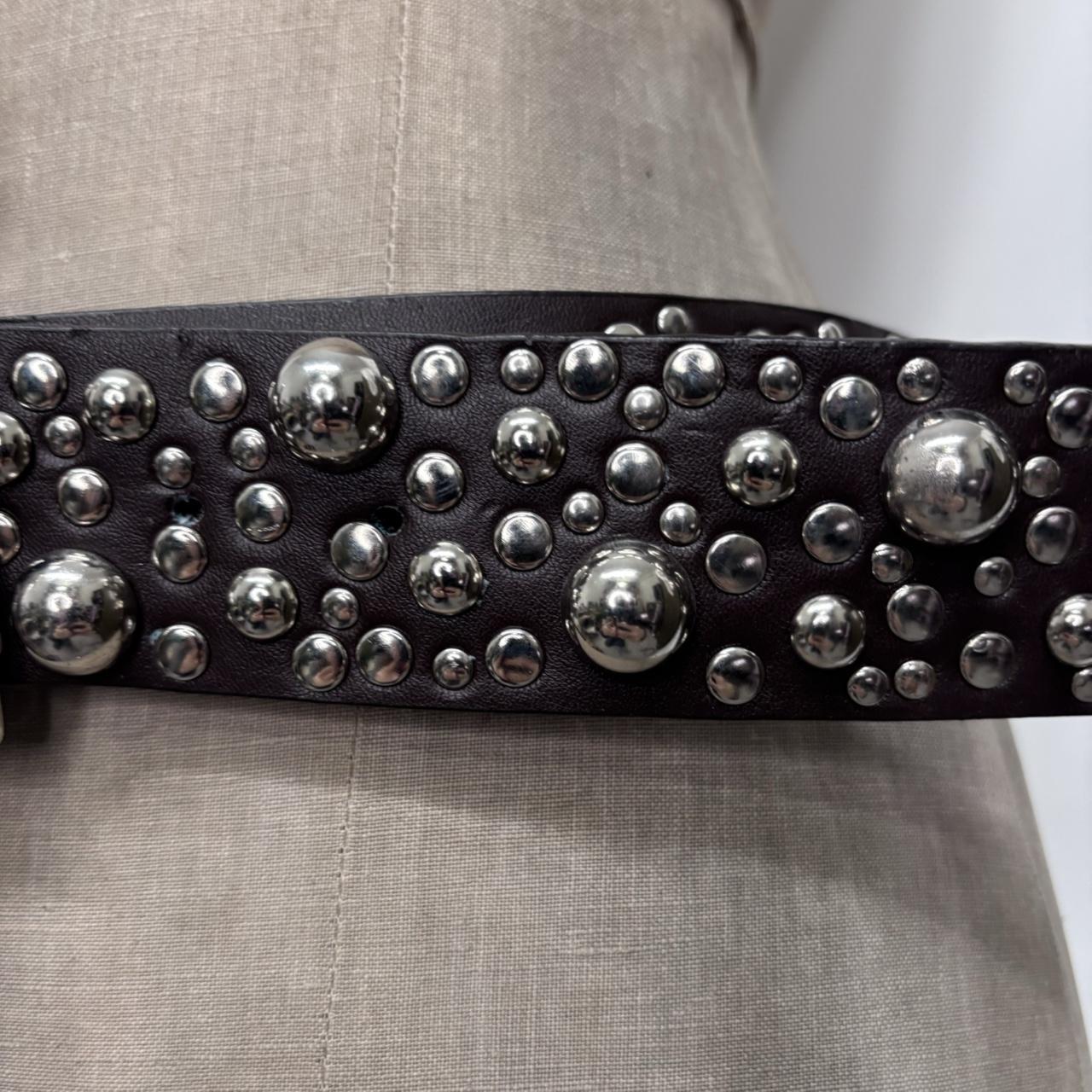 Studded silver eyelet belt