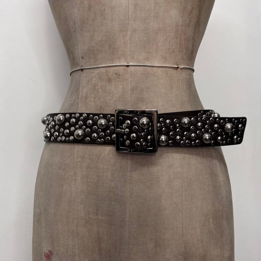 Studded silver eyelet belt