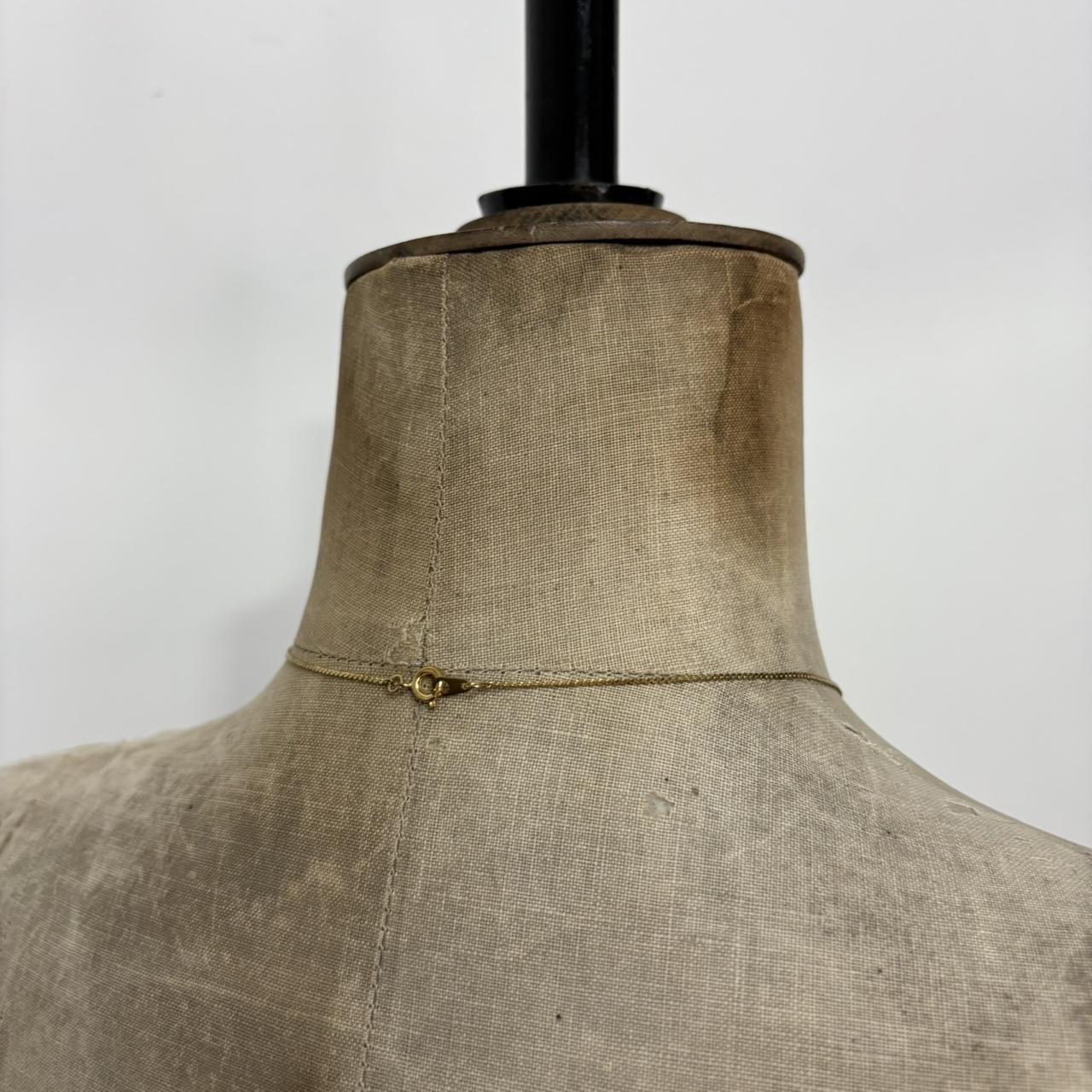 Gold cross necklace