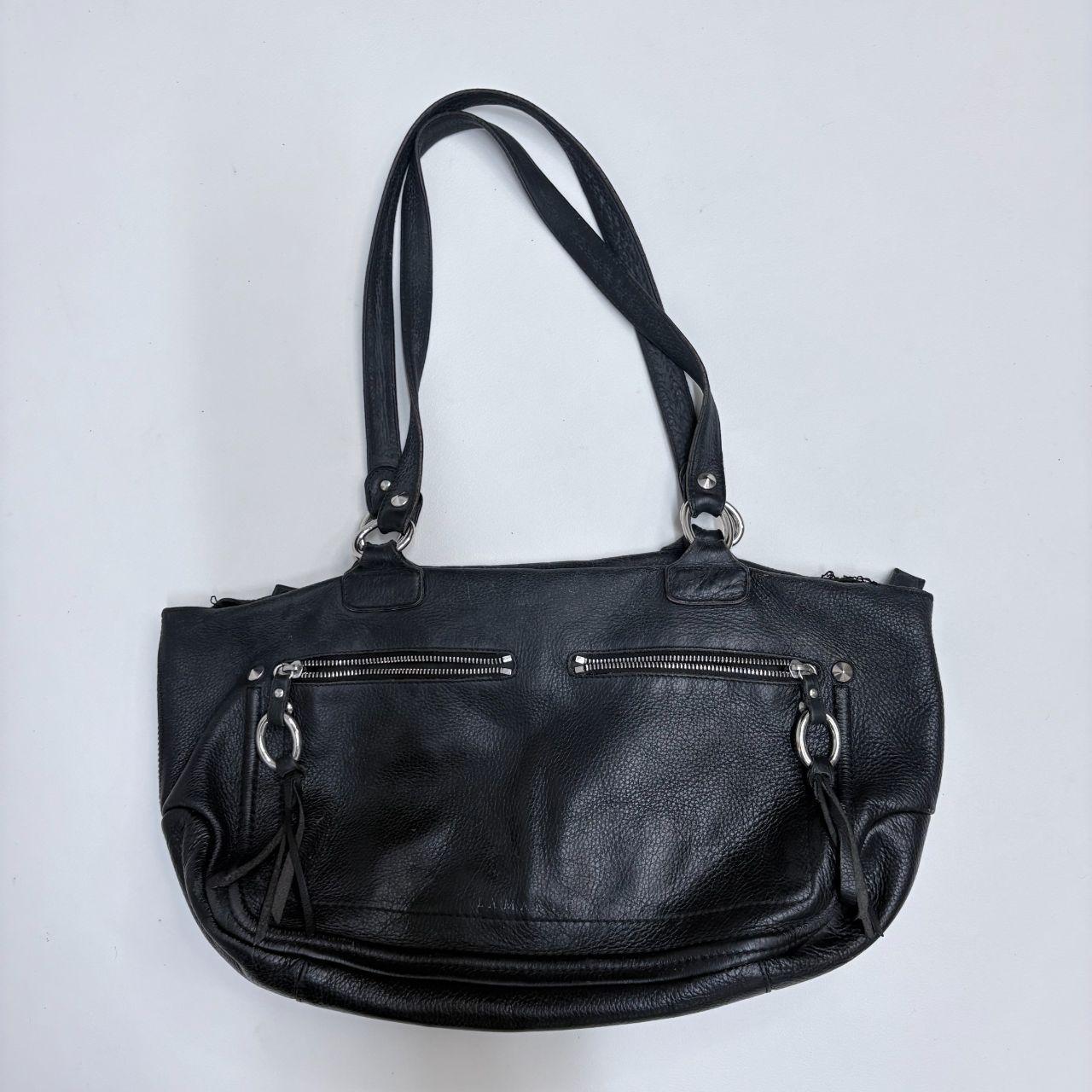 Black leather slouchy tassel bag