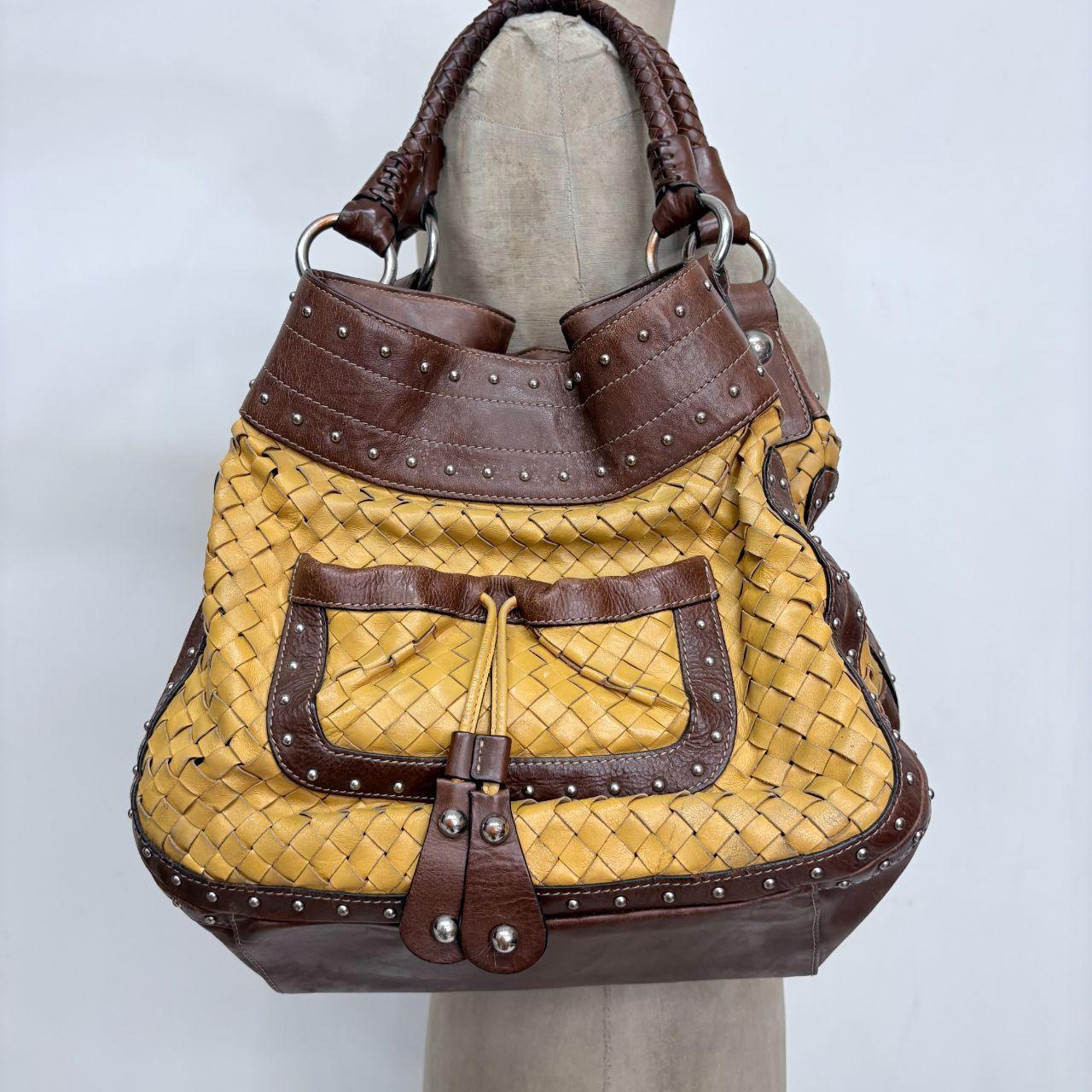 Woven leather studded slouchy shoulder bag
