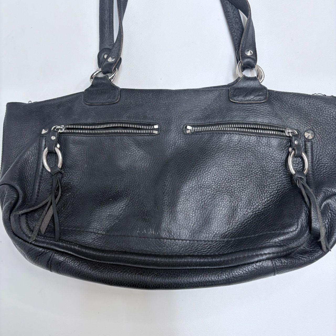 Black leather slouchy tassel bag