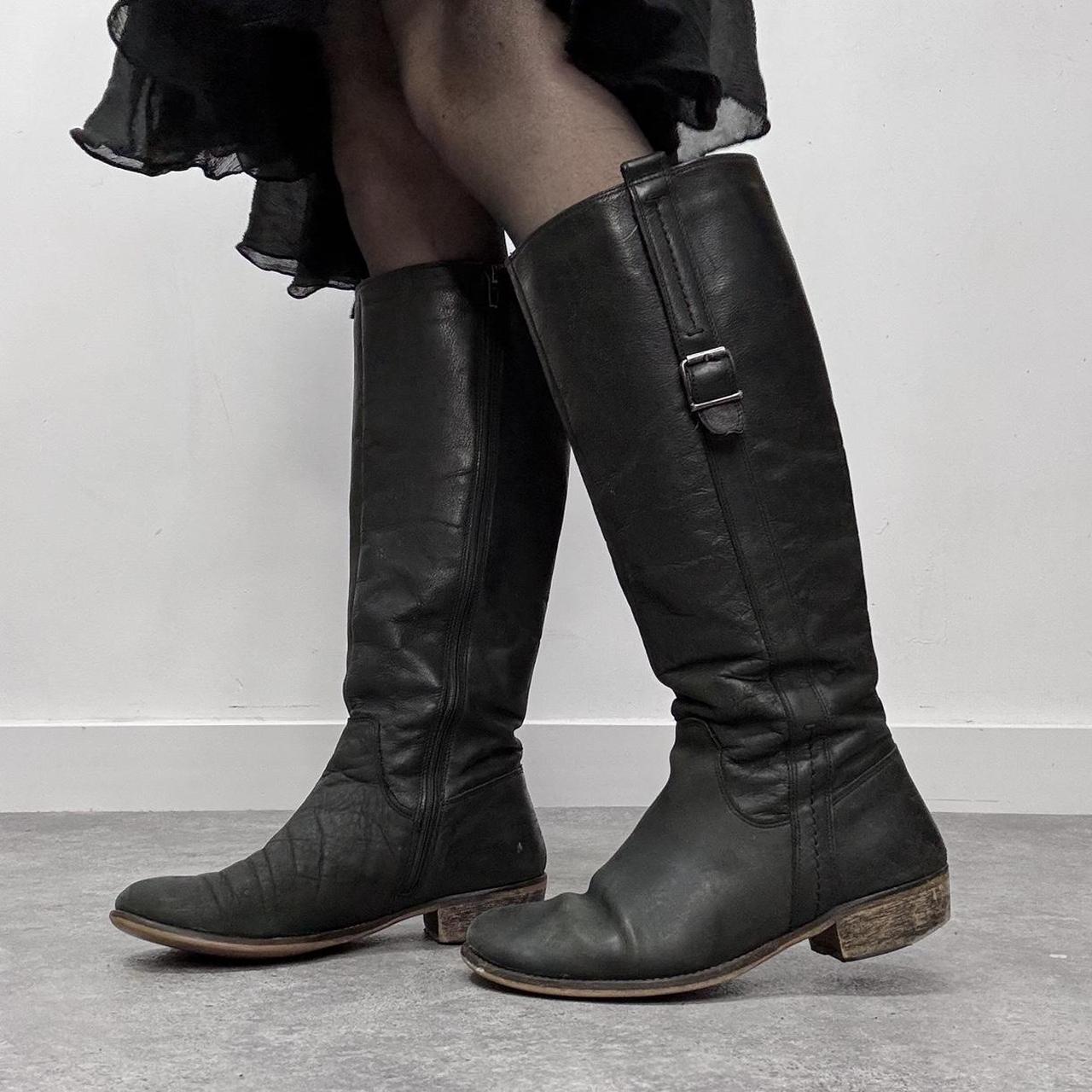 Black leather knee high boots
