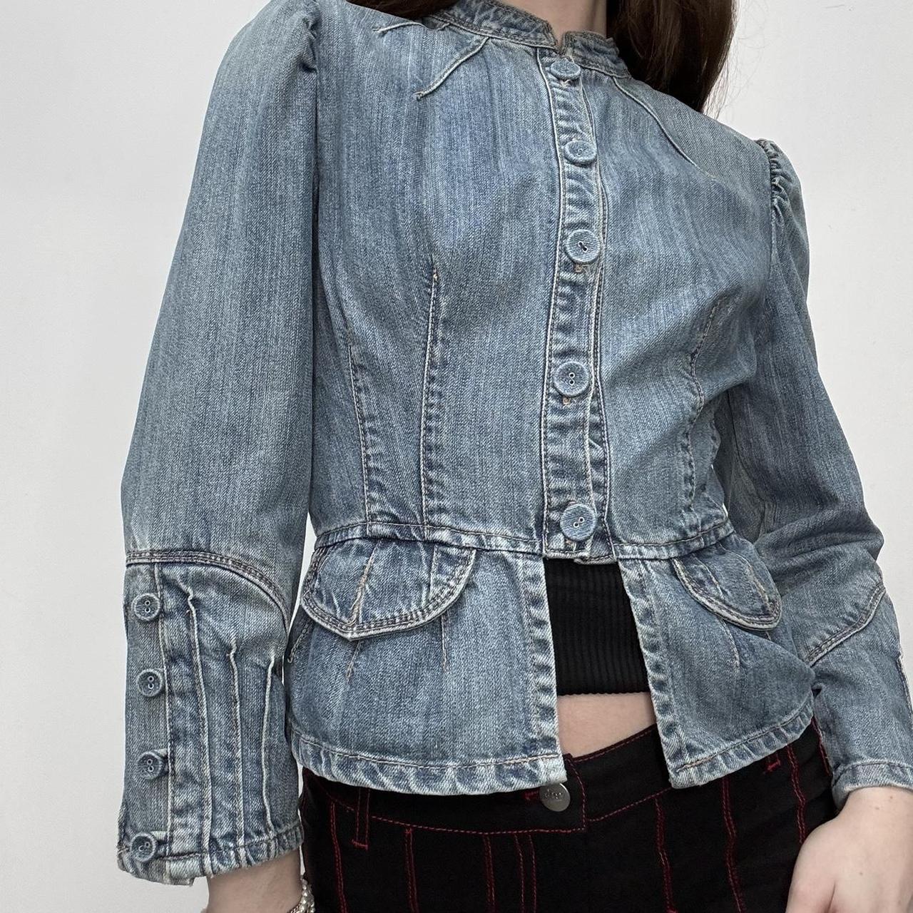 Distressed fitted denim jacket