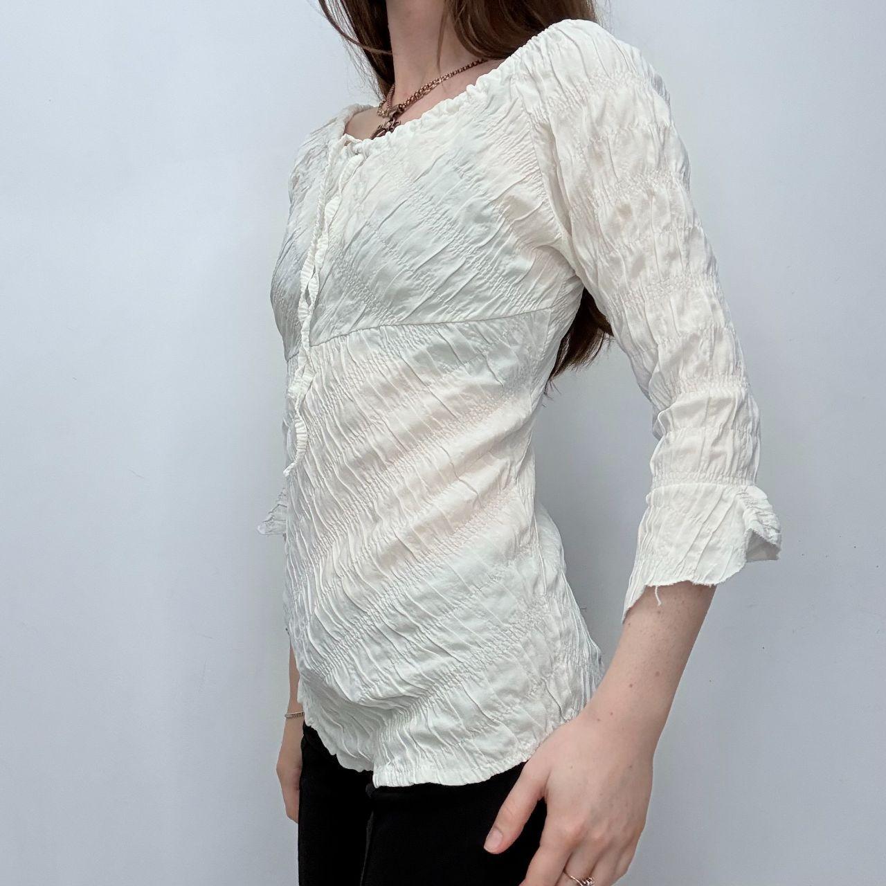 Cream flared wide neck crinkle shirt