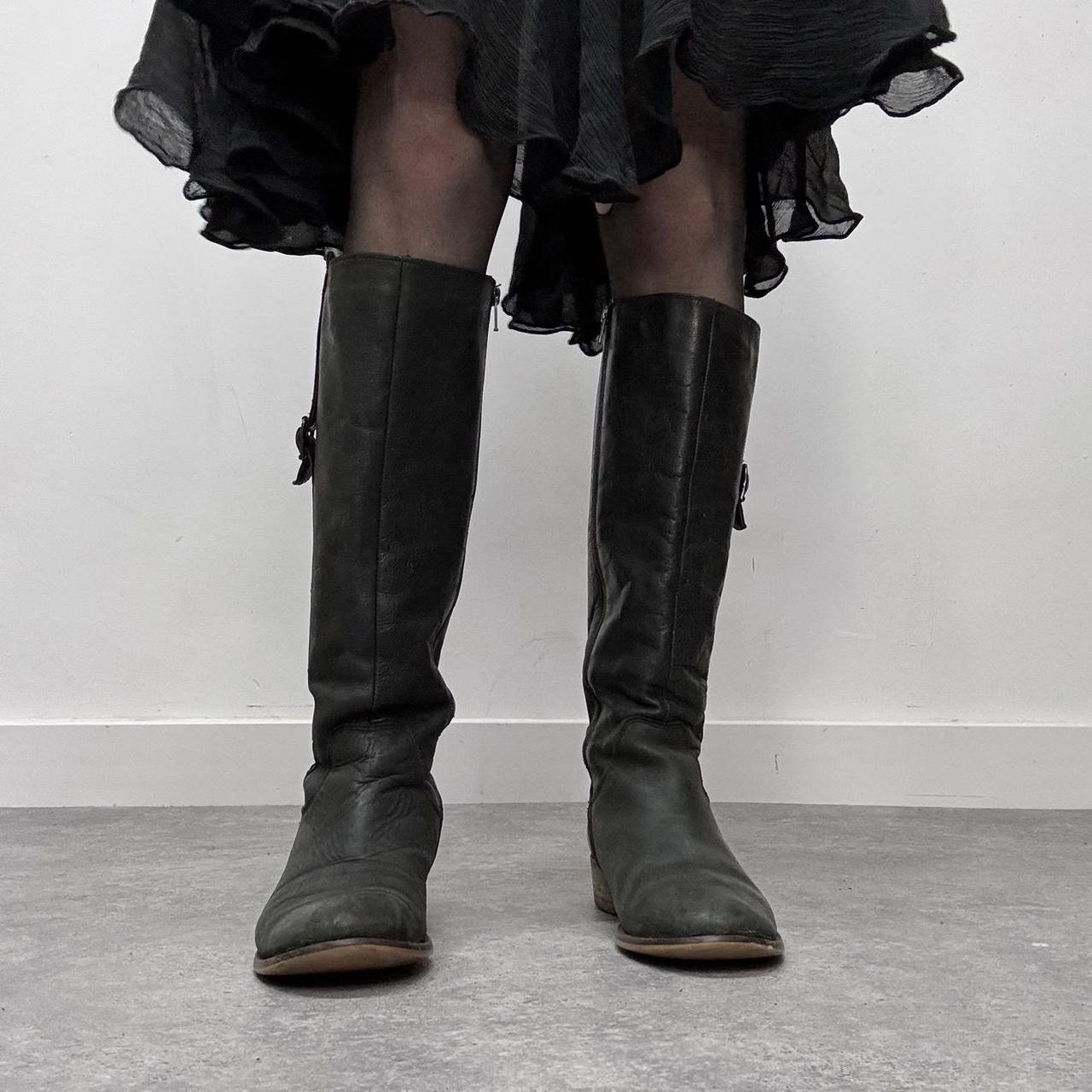 Black leather knee high boots