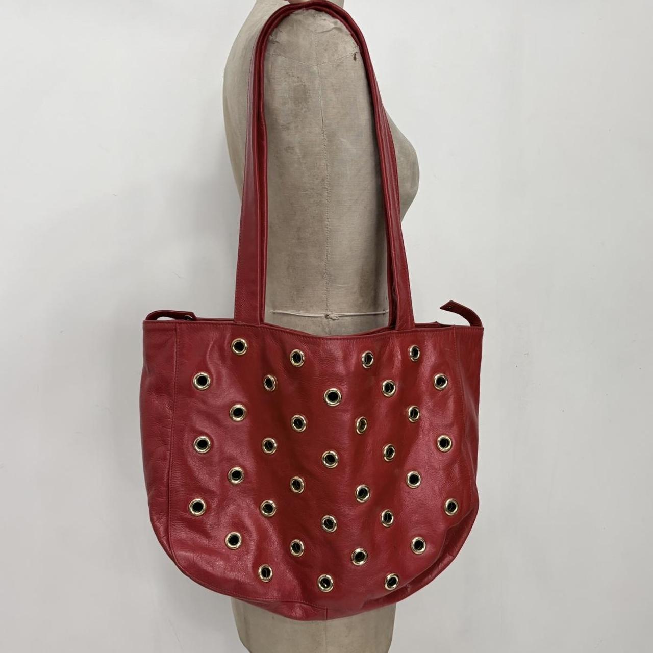 Red leather studded eyelet bag