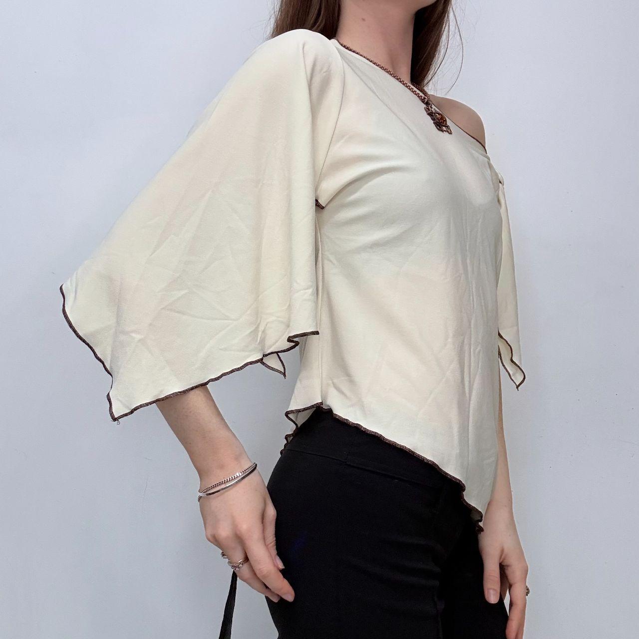 Asymmetric flutter jersey flared top