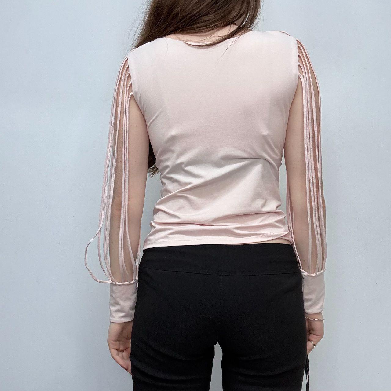Pastel pink cut-out sleeve flared shirt