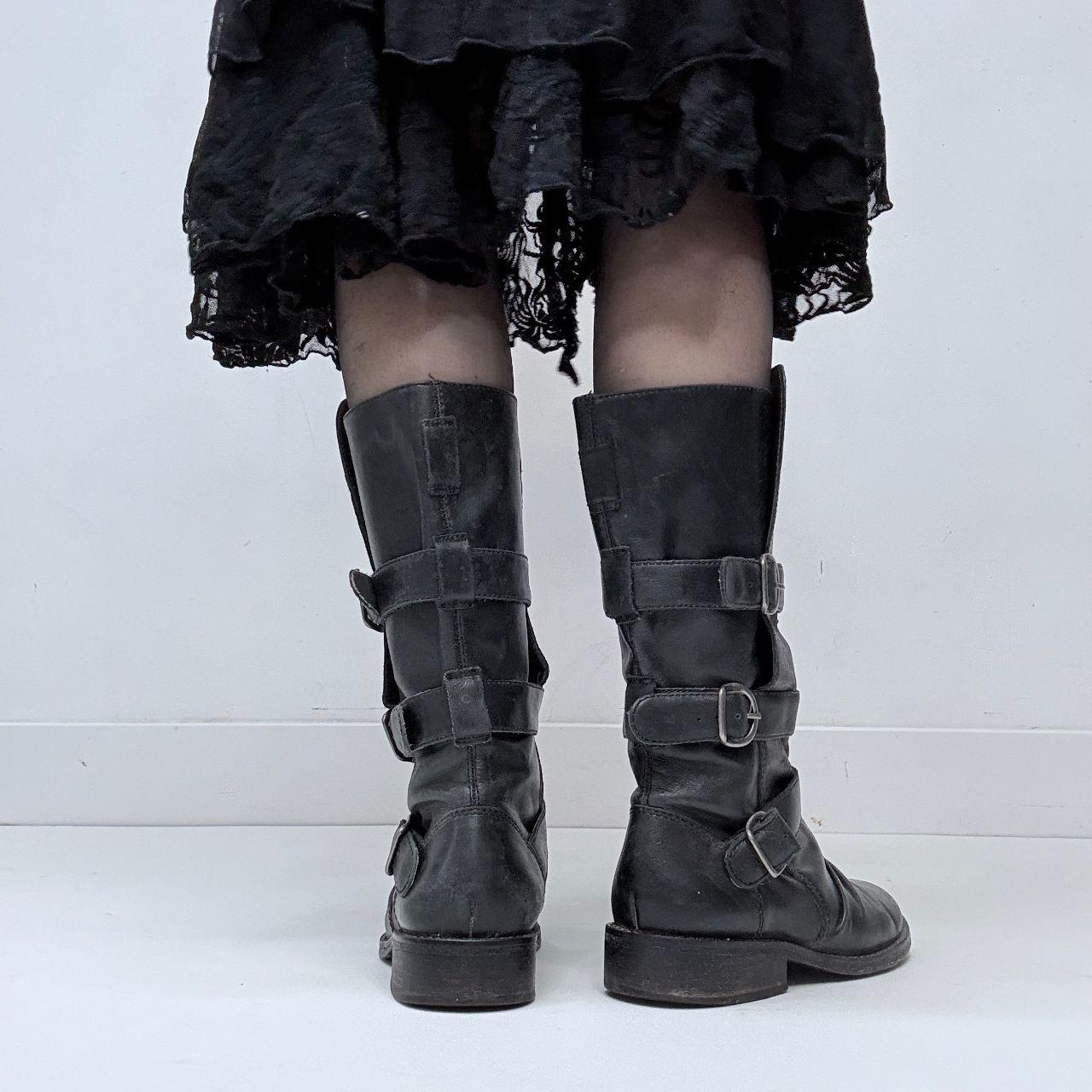 Black leather buckle boots