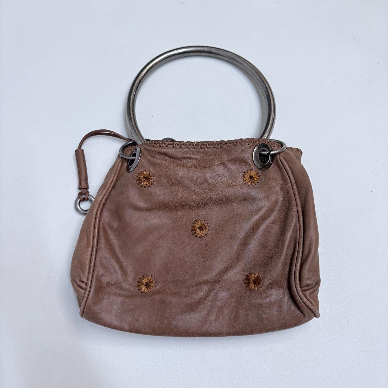 Tan leather metal circle bag