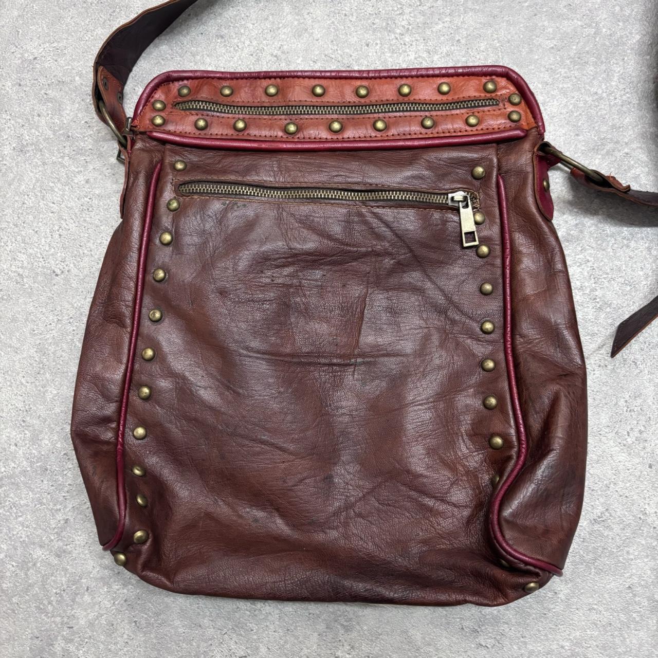 Cow hide studded brown leather bag