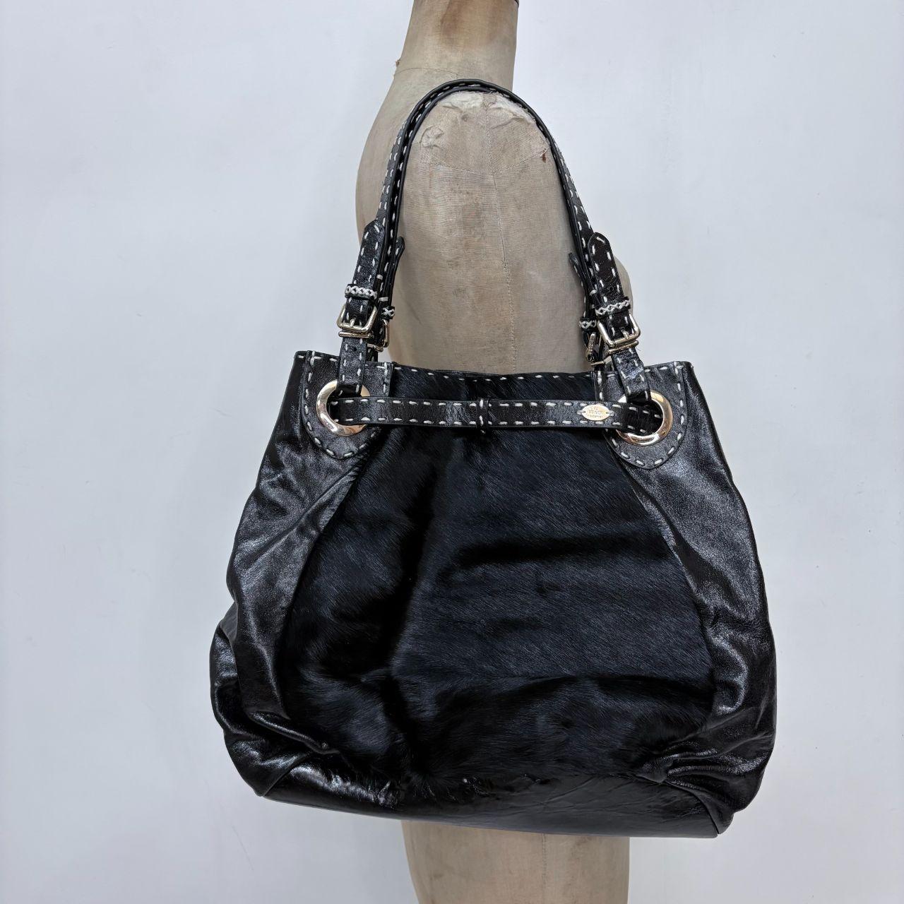 Black ponyhair Fendi eyelet bag