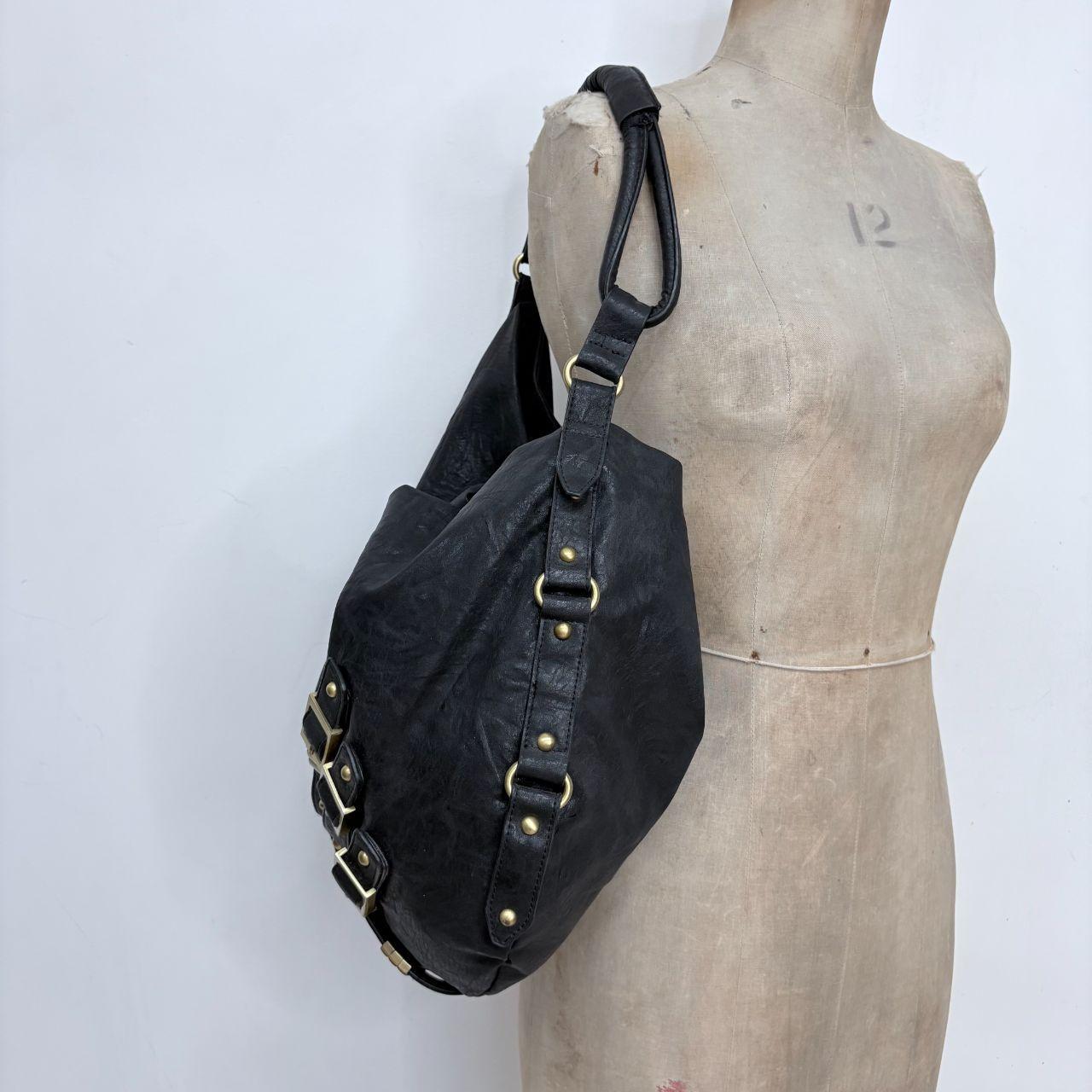 Black slouchy studded hobo bag