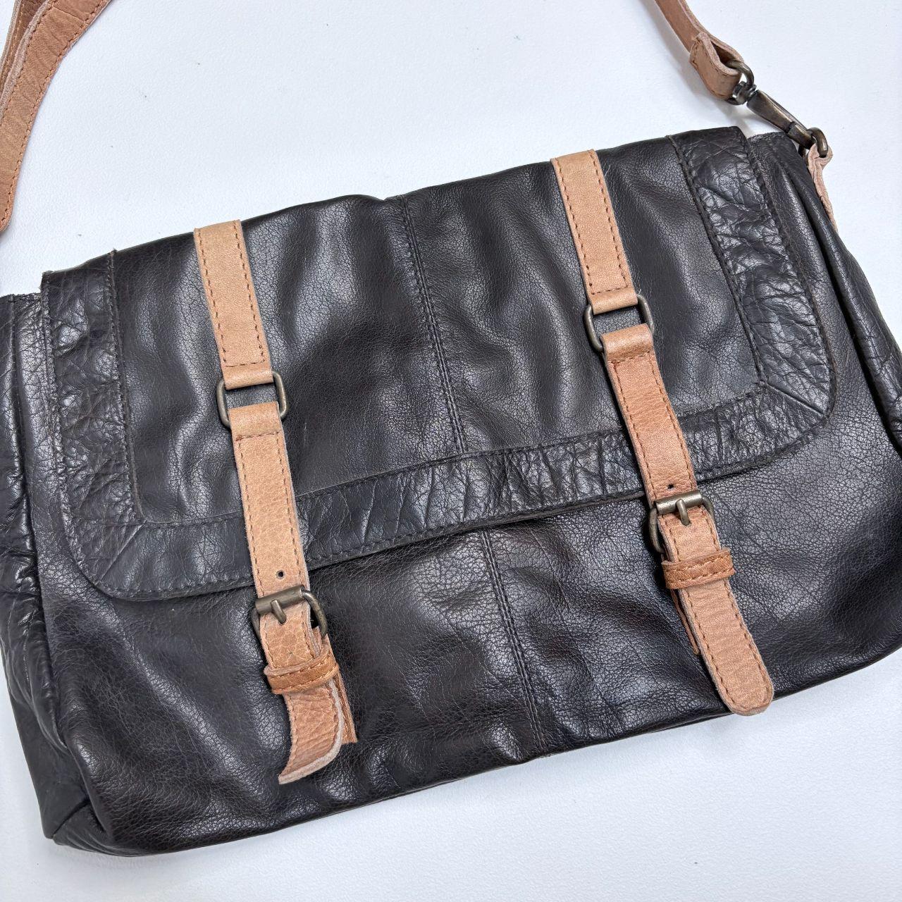 Black buckle leather bag