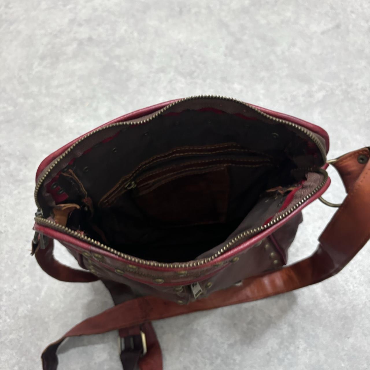 Cow hide studded brown leather bag
