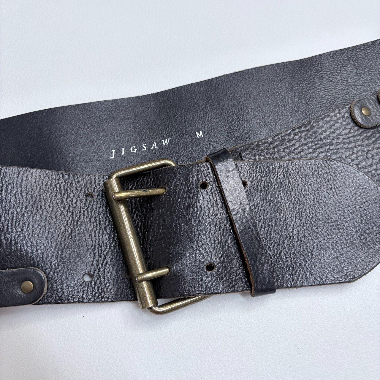 Thick black leather studded belt