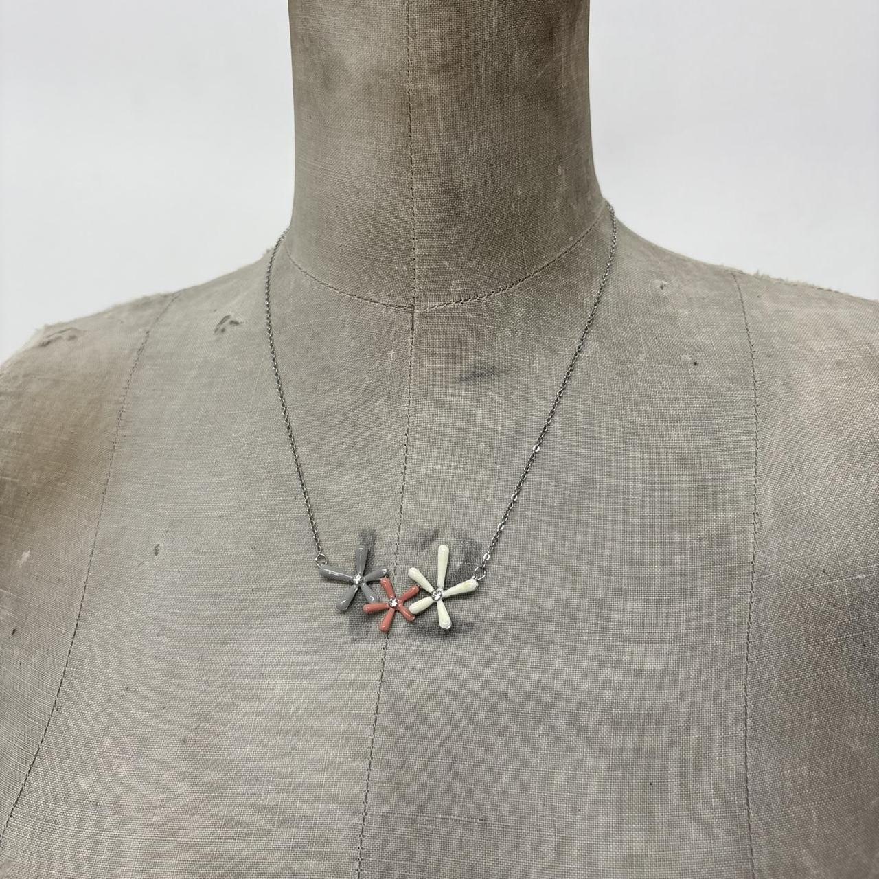 Silver flower pendant