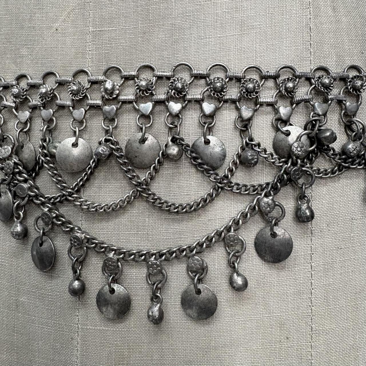 Silver coin chain draped belt