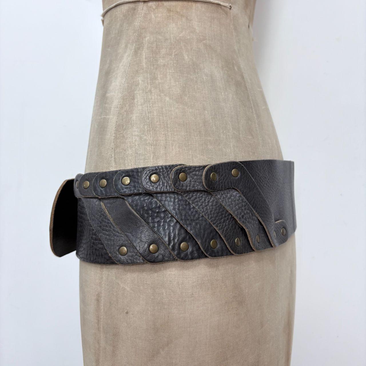 Thick black leather studded belt