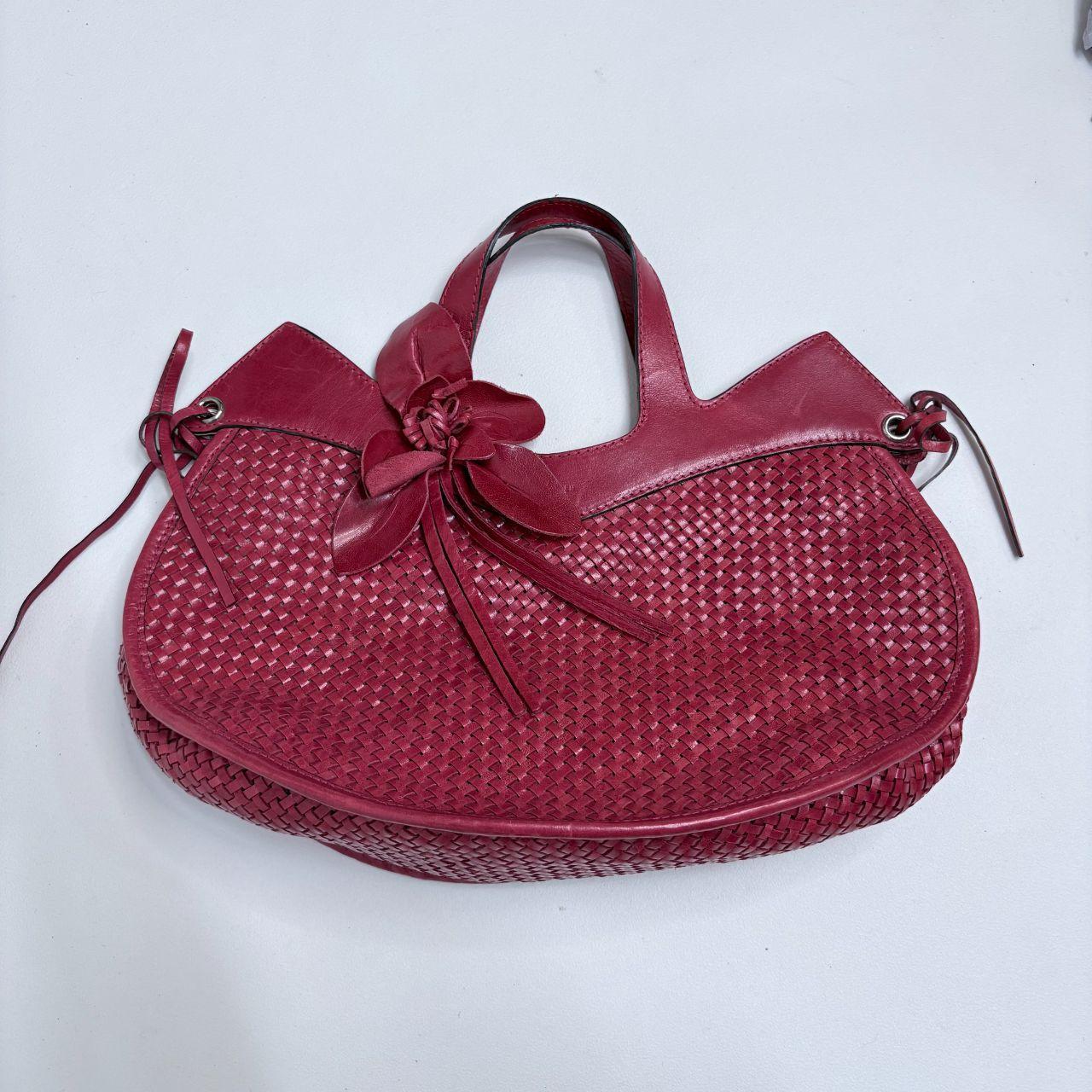 Woven red leather flower bag