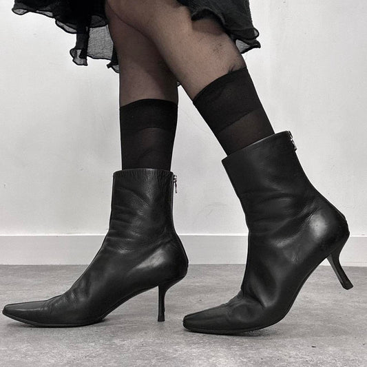 Black pointed heel Prada boots