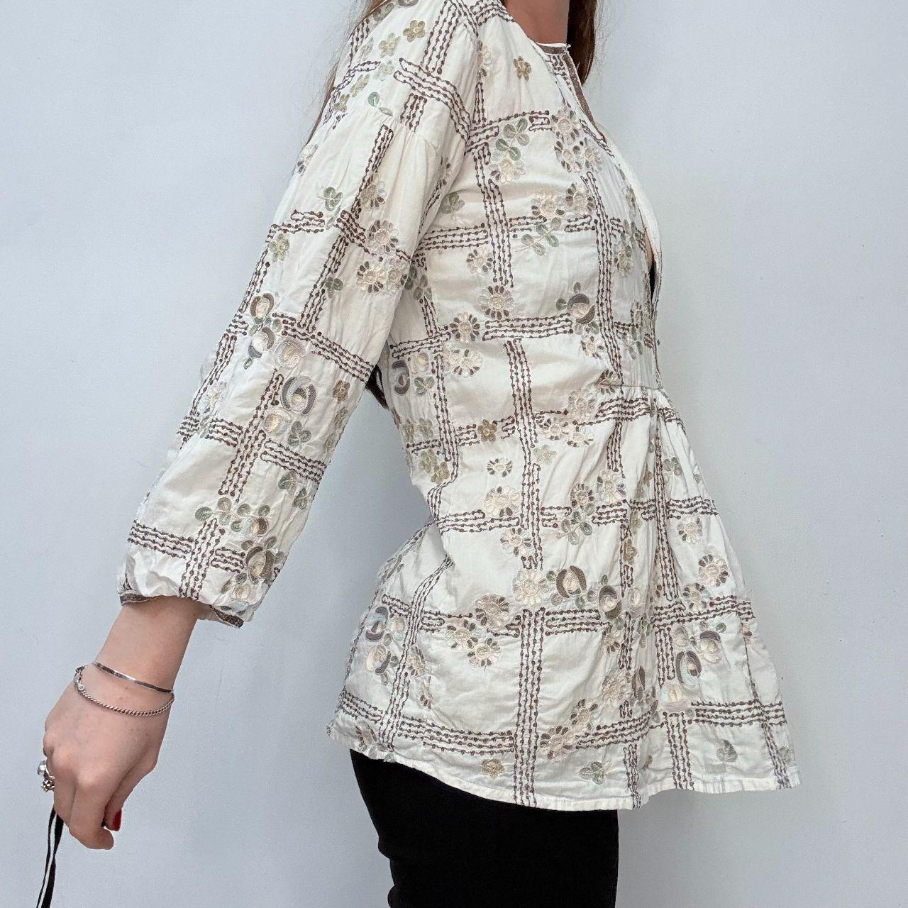 White embroidered flared puff sleeve shirt