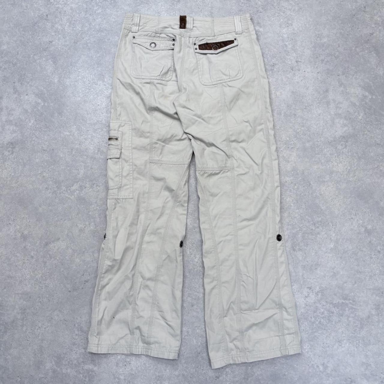 Flared low rise utility cream trousers