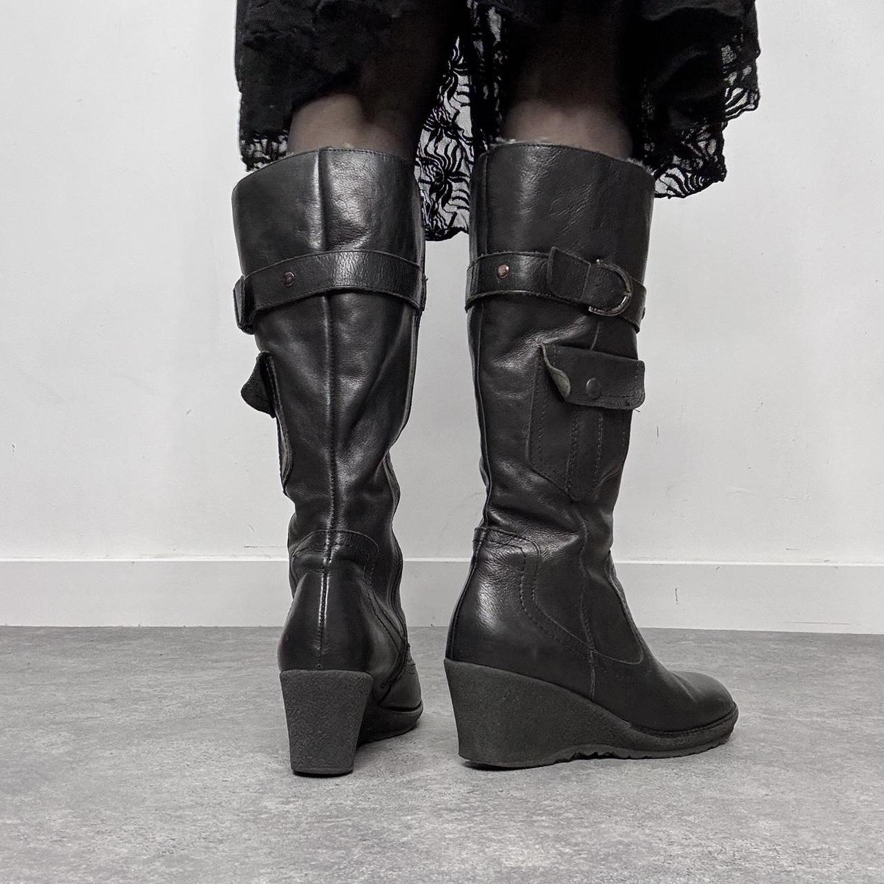 Black leather buckle knee high boots