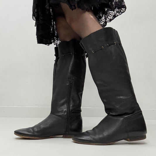 Slouchy black leather knee high boots