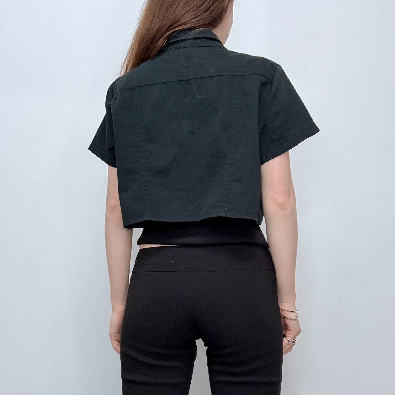 Black cropped asymmetric button top
