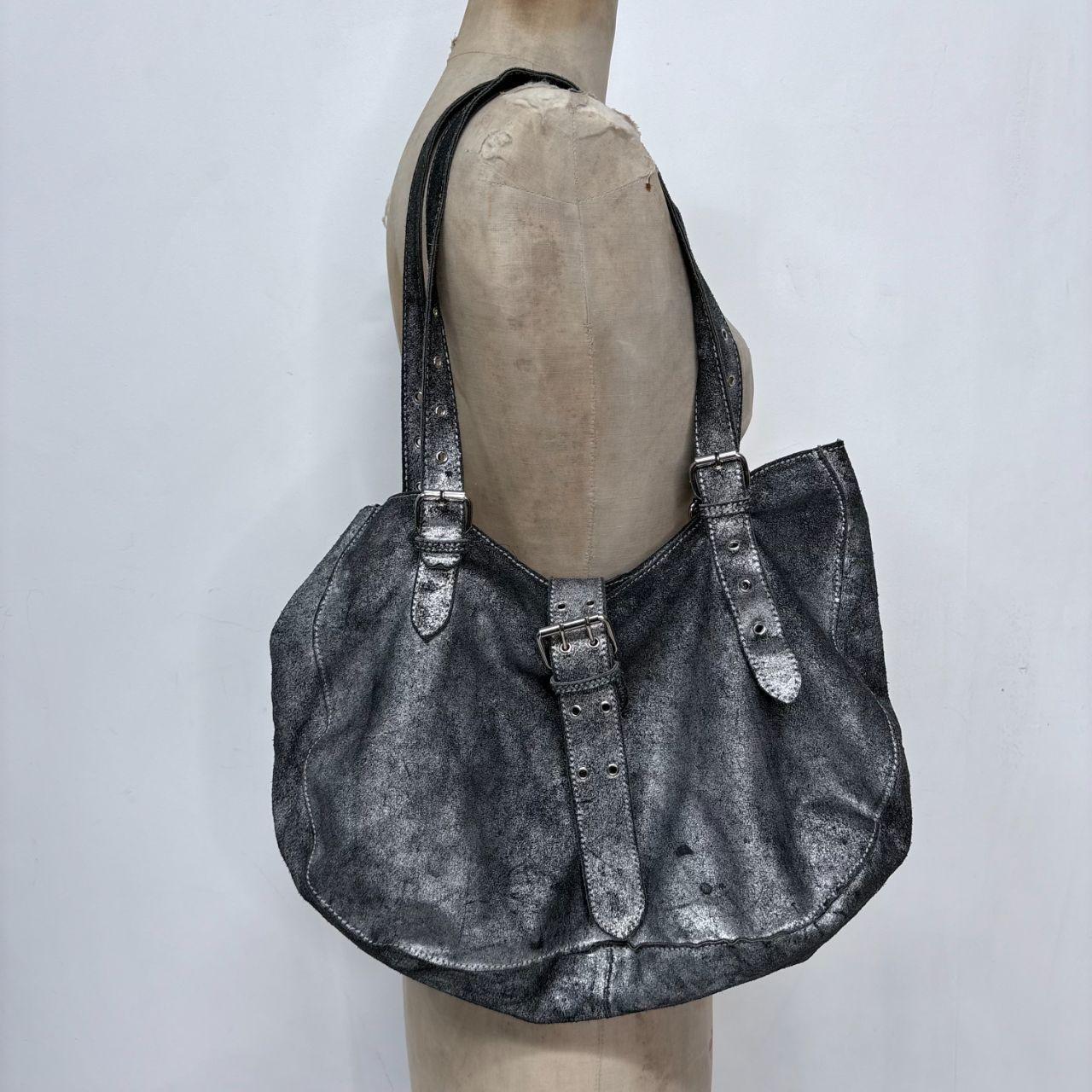 Distressed soft leather cargo buckle handbag
