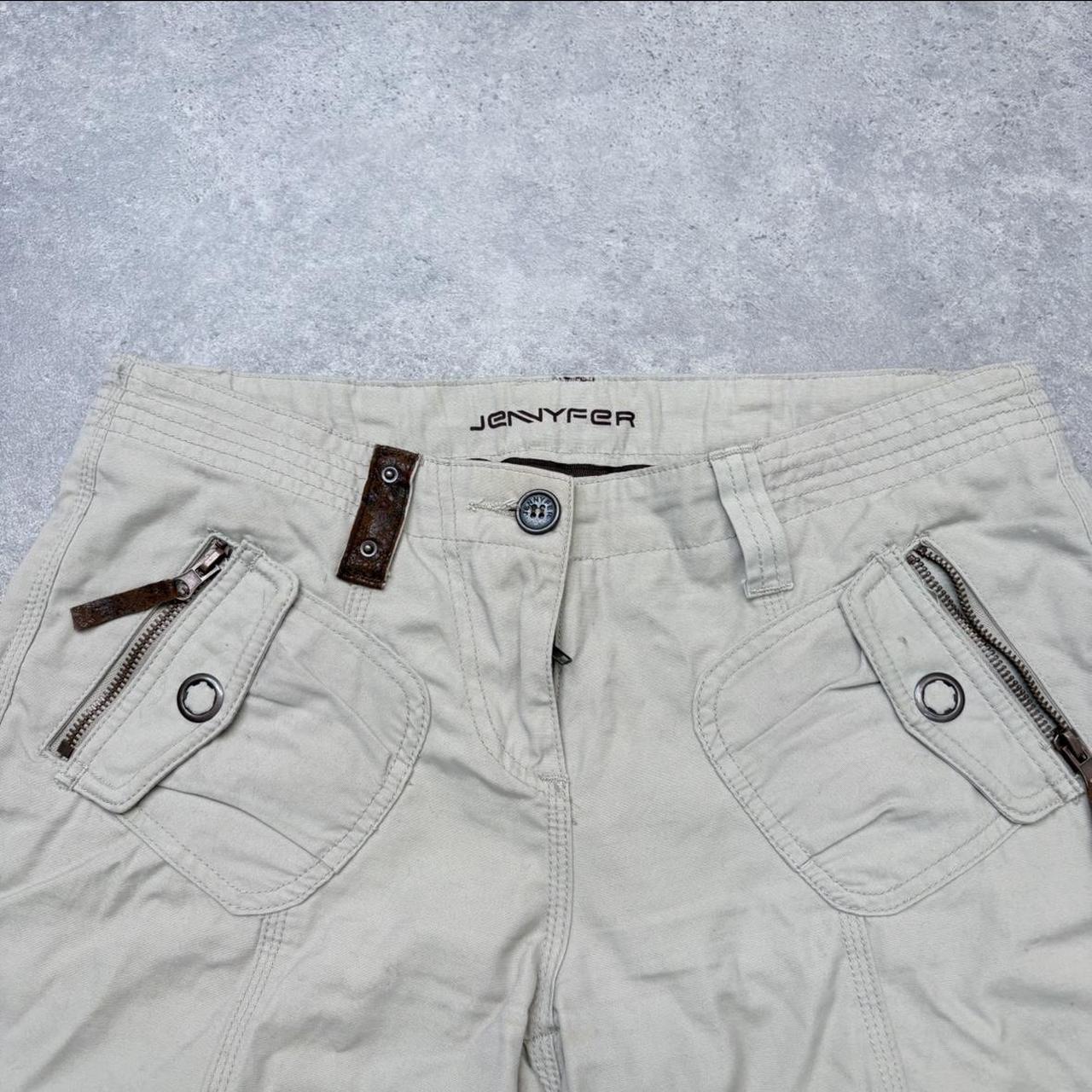 Flared low rise utility cream trousers