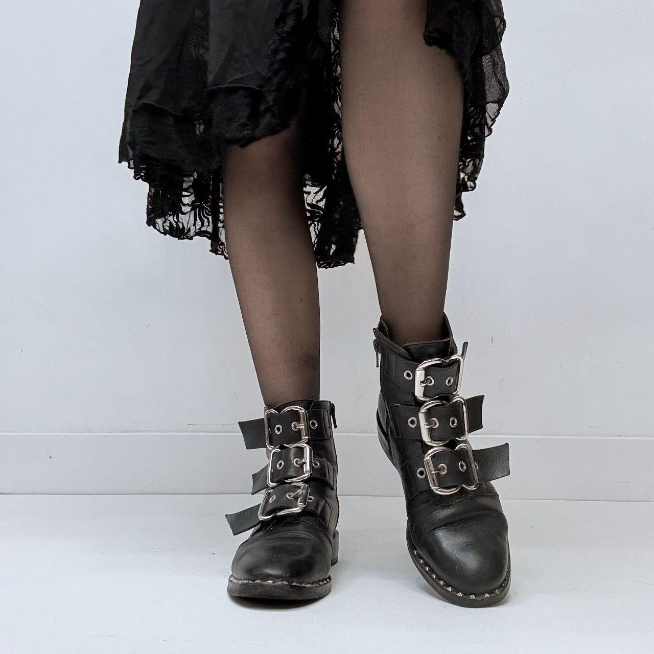 Black leather studded buckle boots