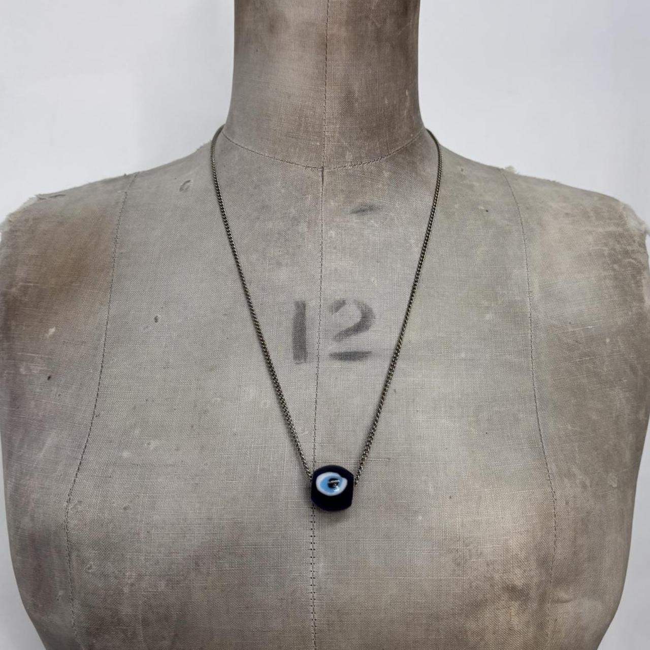 Long chain evil eye necklace