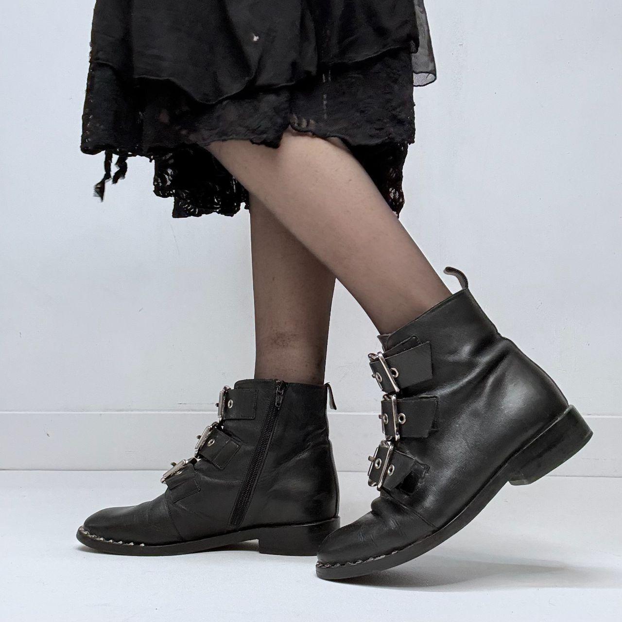 Black leather studded buckle boots