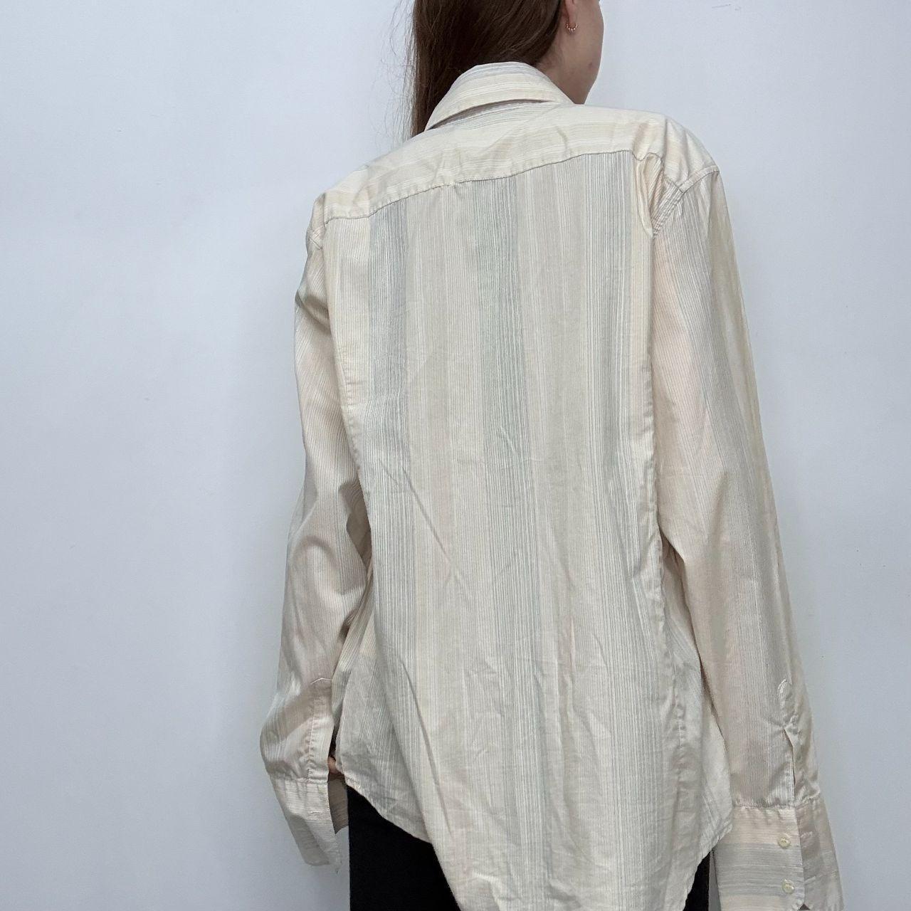 Pinstriped flared graphic shirt