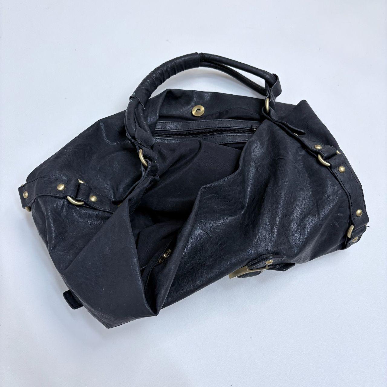Black slouchy studded hobo bag