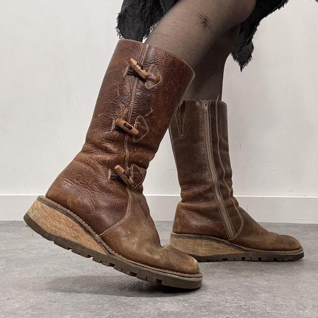 Tan leather heeled toggle boots