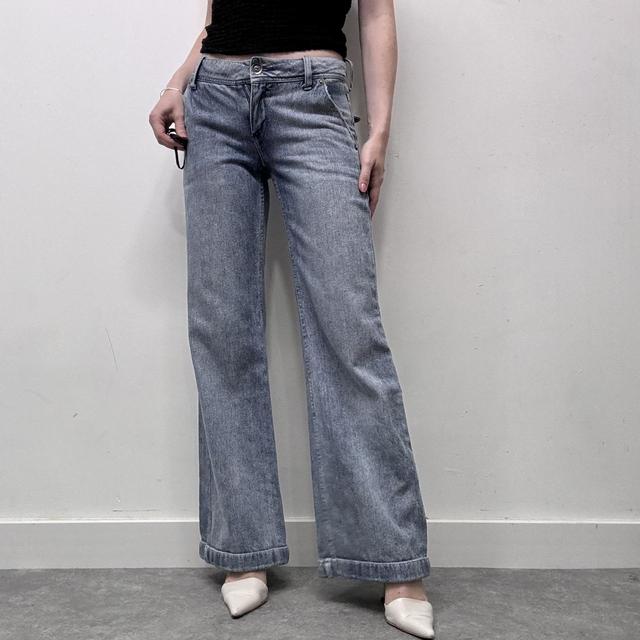 Low rise distressed flared jeans