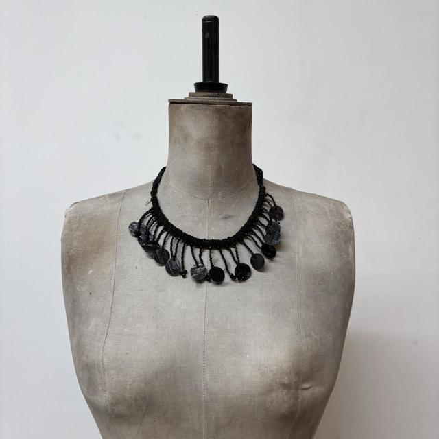 Black beaded drape