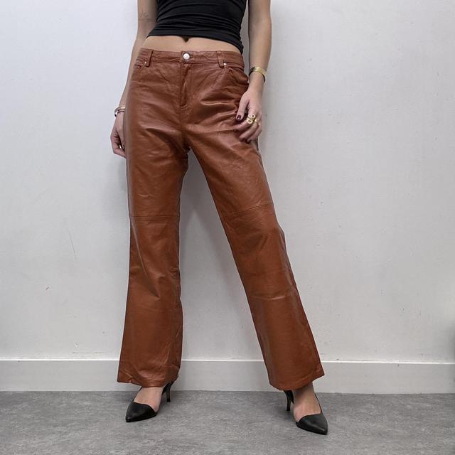 Tan orange leather flared straight leg trousers