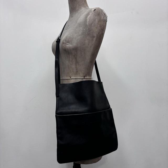 Black leather COS crossbody bag