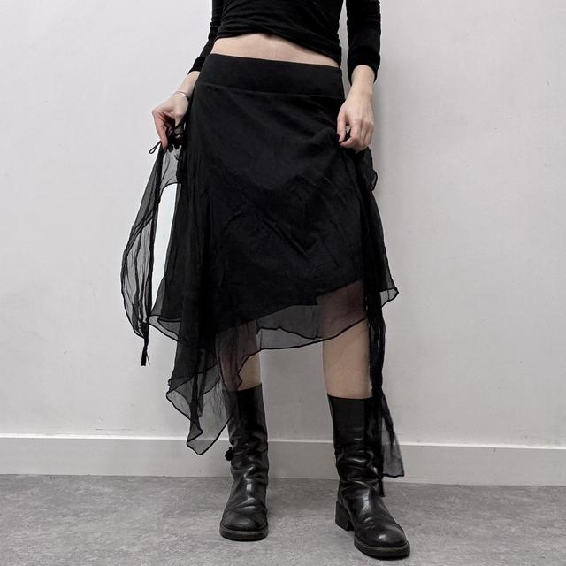 Sheer black asymmetric flutter skirt