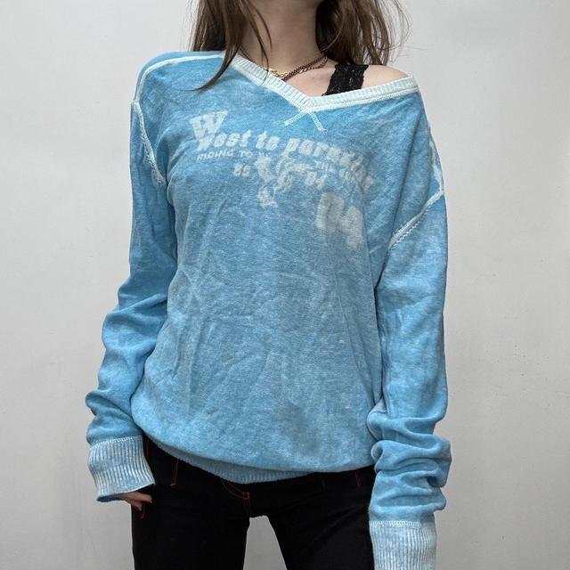 Slouchy oversized distressed knit jumper