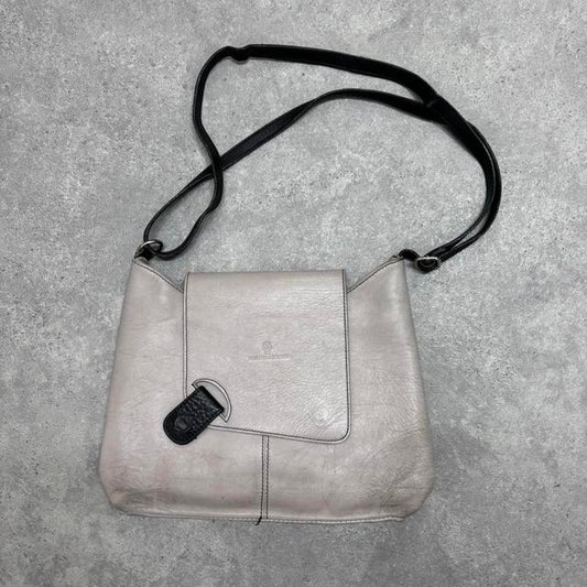 Asymmetrical leather cross-body bag